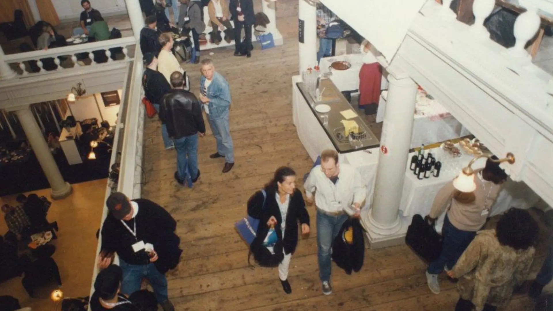 Attendees inside an early ADE conference space